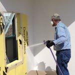 Spraying Liquid Air Barrier on Building Wall Panel